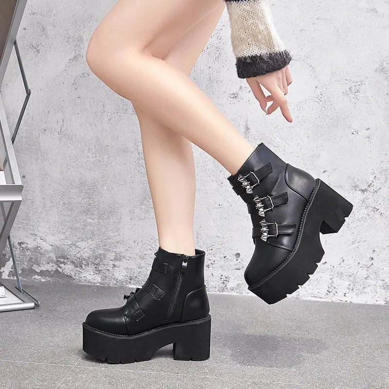 Black women's punk ankle boots with bat buckle and side zip, thick platform heel