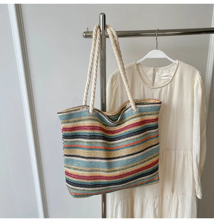 Blue woven nylon shoulder bag with large capacity and textured straw-like design