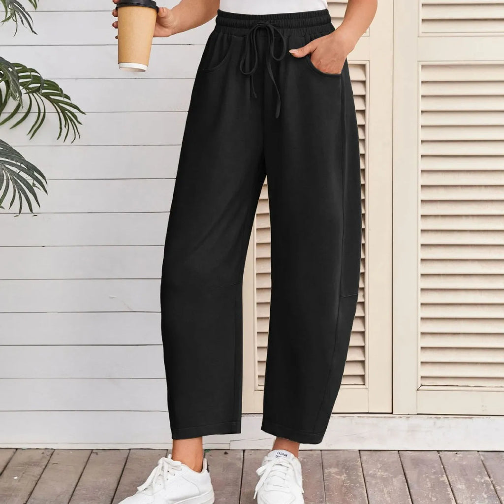 Women's loose fit cropped sweatpants with drawstring waist and side pockets in cotton blend fabric