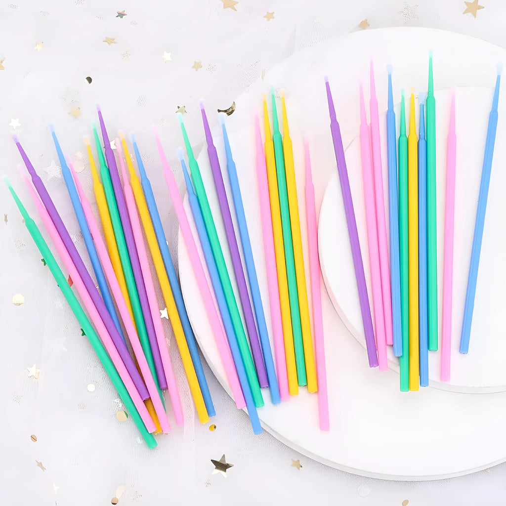 Disposable micro applicator brushes with bendable handles and flocked tips in assorted colours.