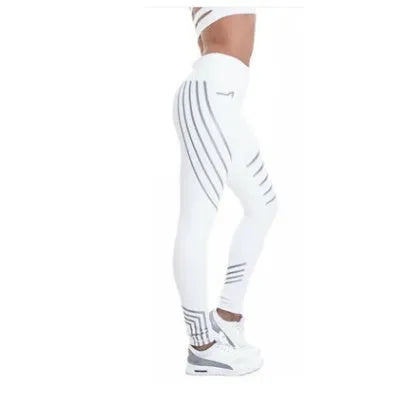 Women's reflective workout leggings with glow print in black and white colours showing slim-fit pencil pants design