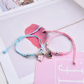 Magnetic couple bracelet pair showing crown design with electroplated alloy construction and magnetic fastening