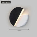 Rotating round LED wall light with warm light, 220mm diameter, wrought iron acrylic, black white finish