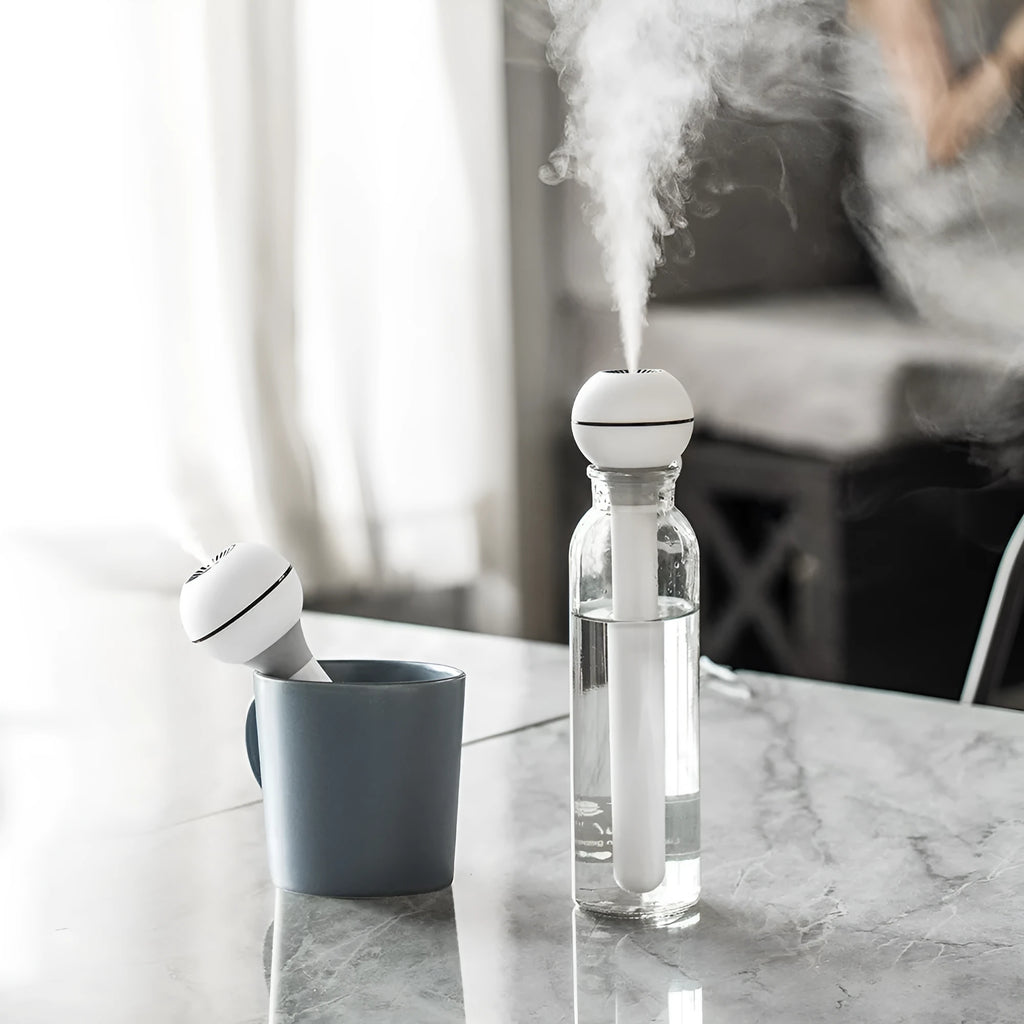 Magic Wand columnar humidifier in pink or white with USB power cable and 1 litre water tank