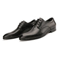 Men's black cow leather derby shoes with a pointed toe and rubber sole on a grey background.
