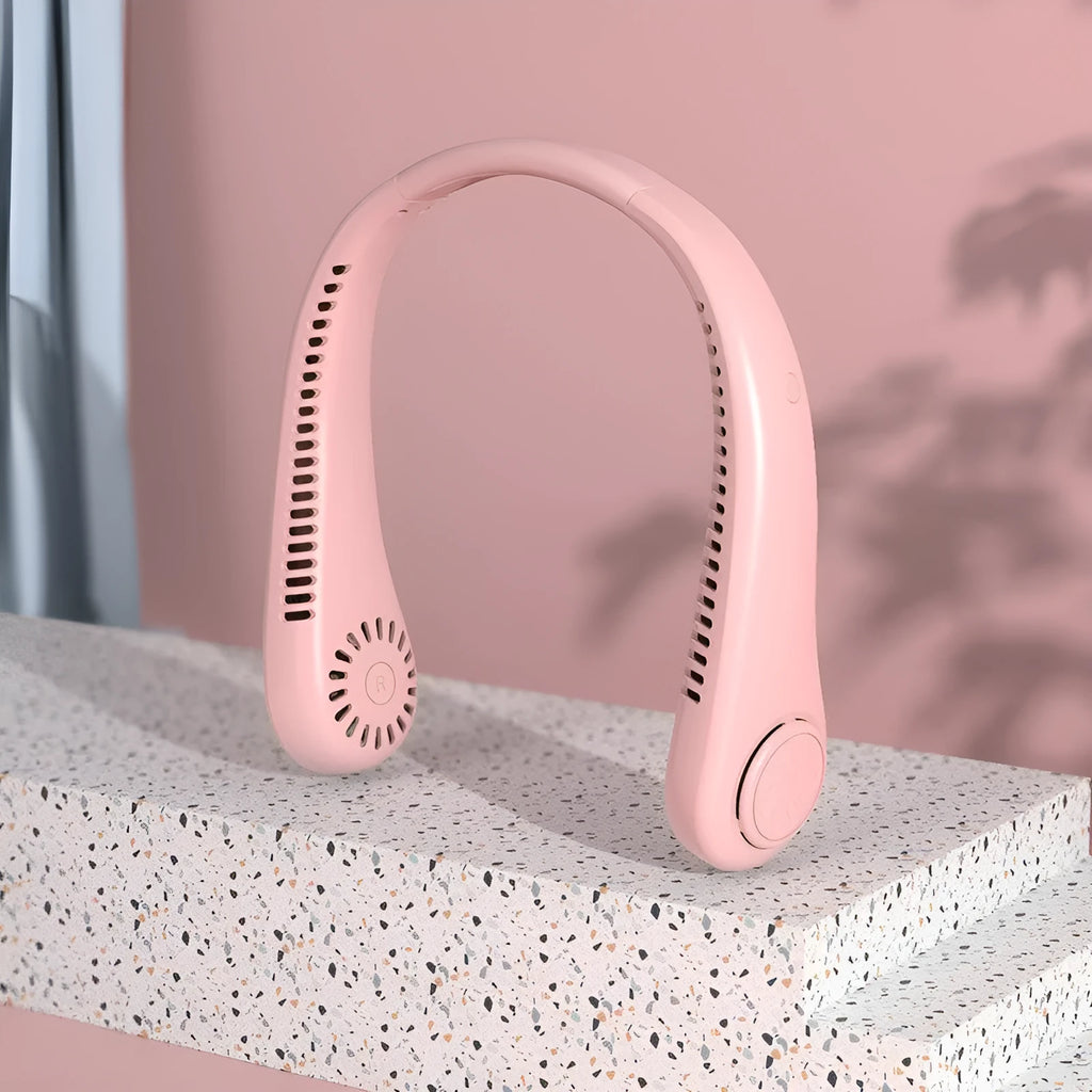 Pink portable bladeless neck fan with adjustable speed settings and USB charging cable