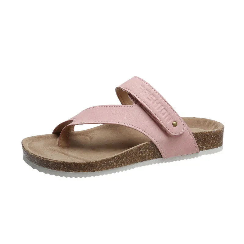 Solid colour thick-soled flat toe ring flip-flops on a white background.