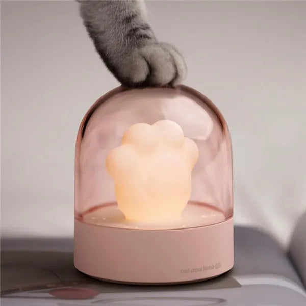 Grey or pink cat paw shaped USB rechargeable night light with music box and adjustable brightness levels