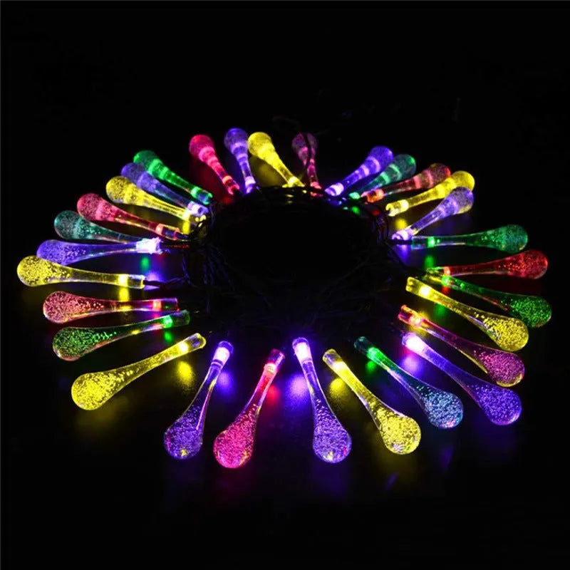 Solar-powered LED outdoor string lights with bubble drop pendants on 6.5 metre cable