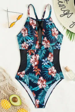 Women's deep V-neck one-piece swimsuit in a printed pattern, shown in a solid colour option.