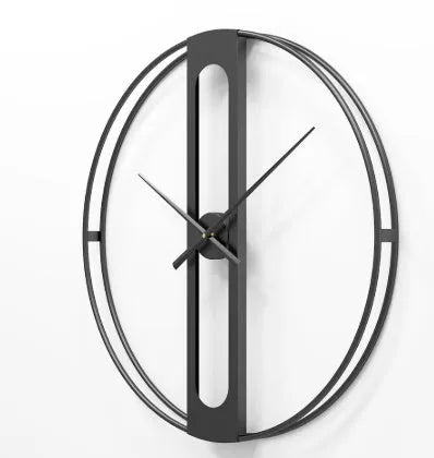 Round metal wall clock with 50cm diameter in black or gold colour on a white wall.