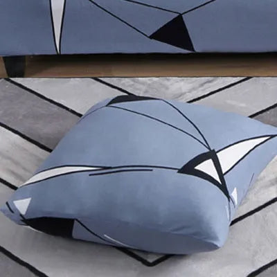 Printed geometric abstract stretch sofa slipcover fitted on a double-seater sofa.