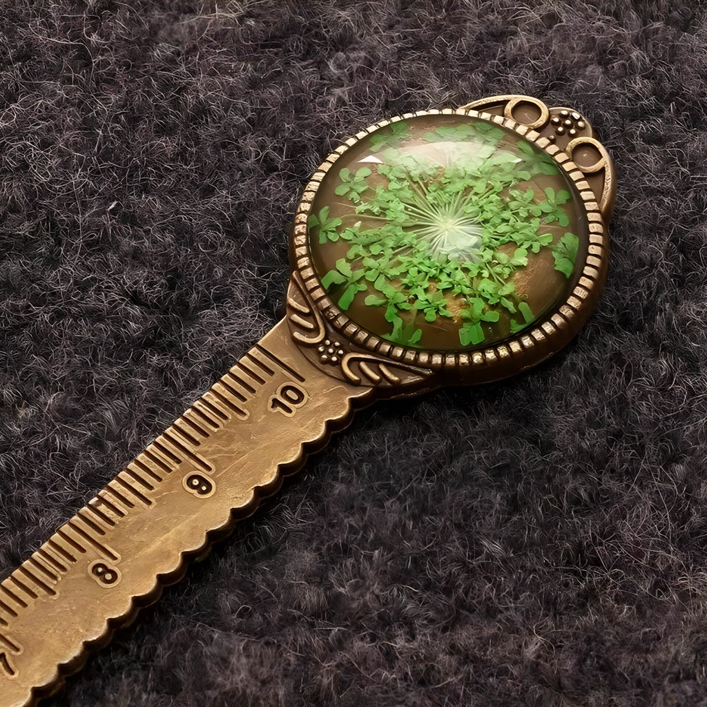 Handmade dried gypsophila flower bookmark ruler showing lace flowers, daffodils, and clovers on 12cm length