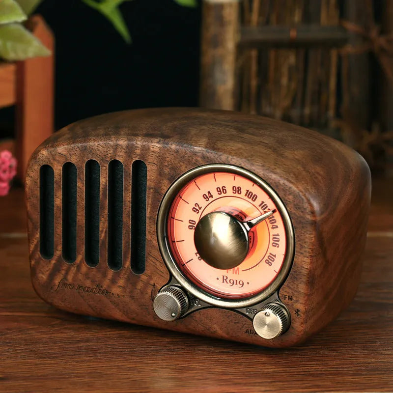 Retro wooden wireless mini speaker showing wood grain texture and compact size