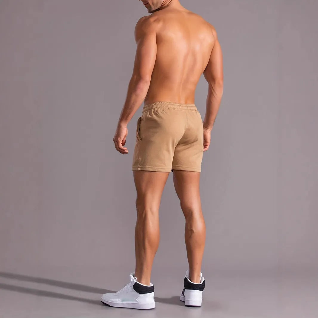 Men's khaki coconut print polyester sports shorts with straight cut and micro elasticity