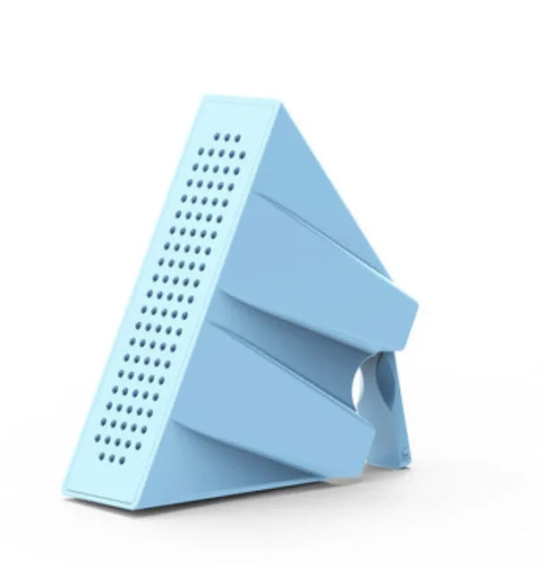 A small black plastic phone amplifier stand holding a smartphone on a desktop.