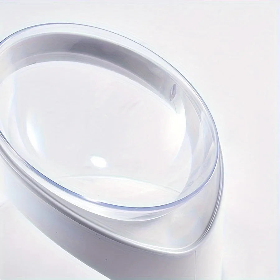 White elevated tilted plastic cat food bowl for ergonomic feeding.
