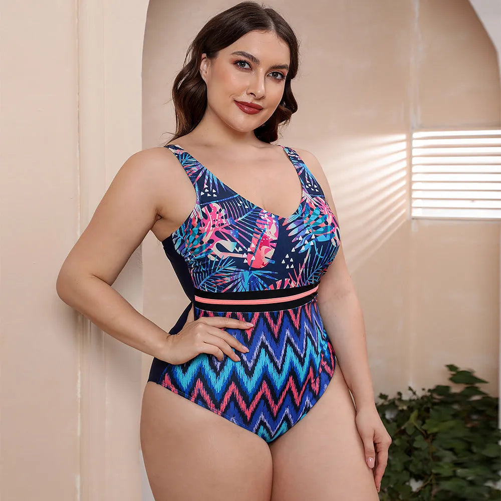Women's striped spaghetti strap one-piece swimsuit in blue, white, or green printed patterns.