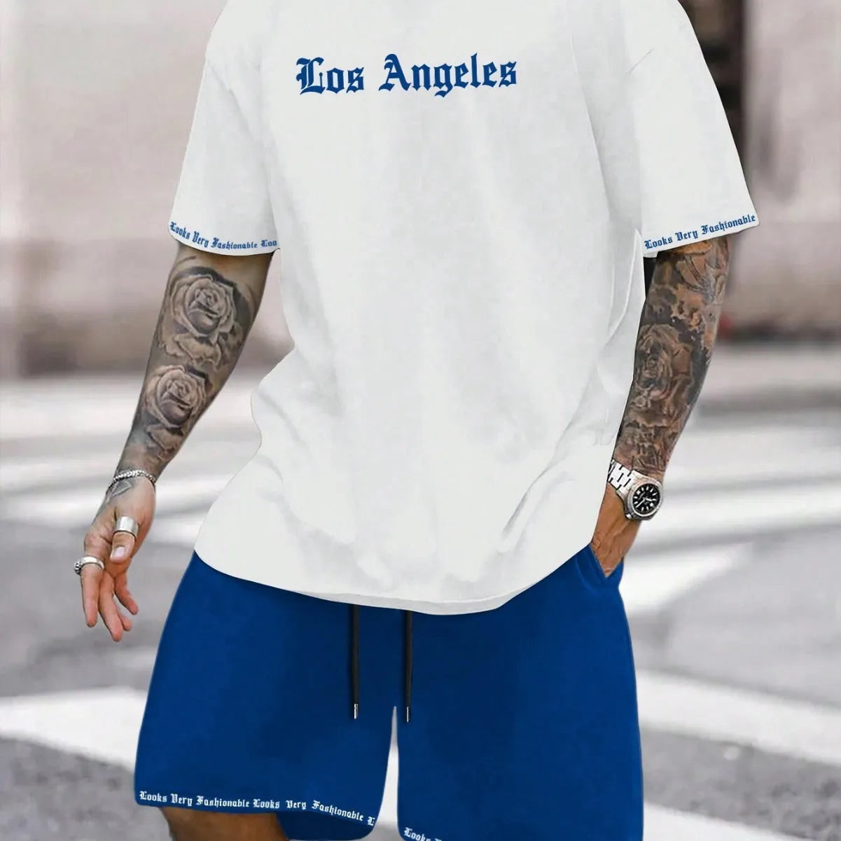 Sports style short-sleeved top and matching shorts set in solid colour on hanger