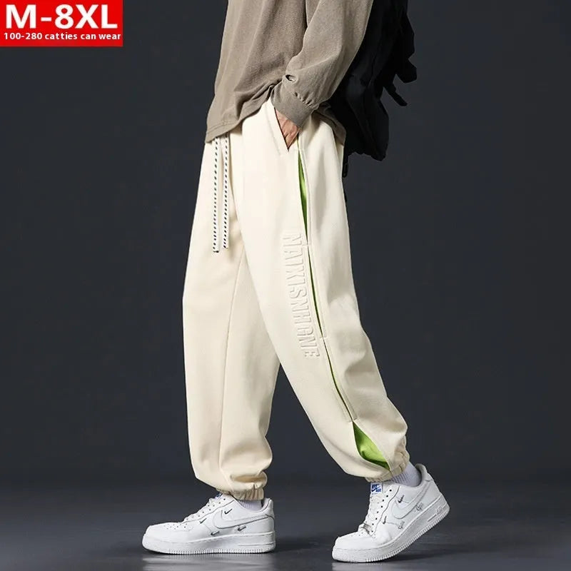 Men's loose cotton trousers with ankle banding and skinny leg design in black colour