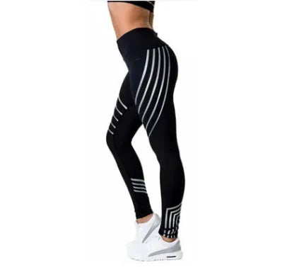 Women's reflective workout leggings with glow print in black and white colours showing slim-fit pencil pants design