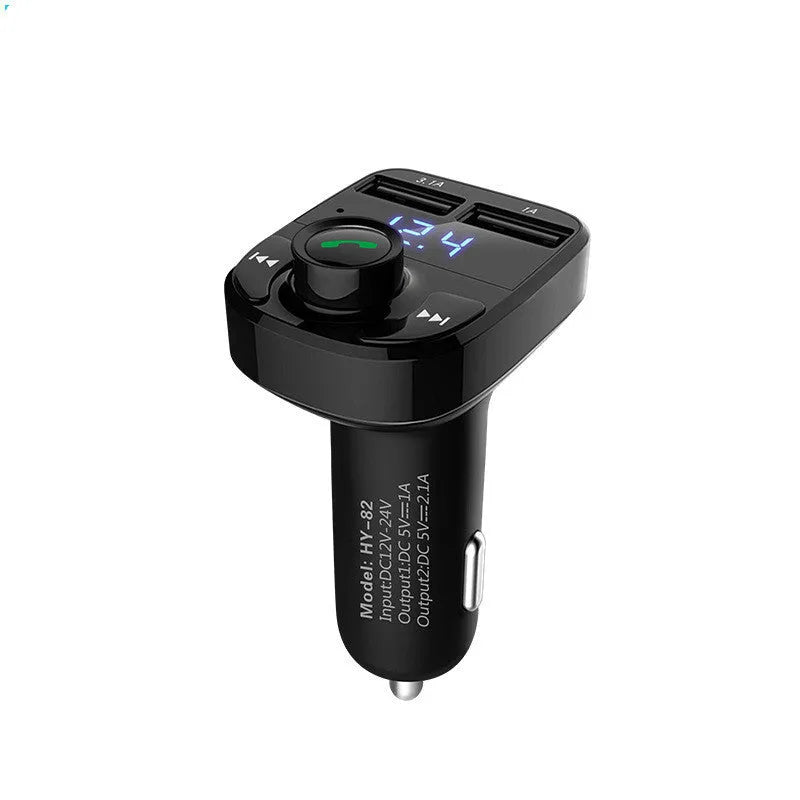 HY82 car MP3 player and Bluetooth FM transmitter with dual USB charging ports plugged into a car dashboard.