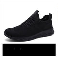 Men's black and white breathable mesh sport shoes with lace-up closure and round toe design