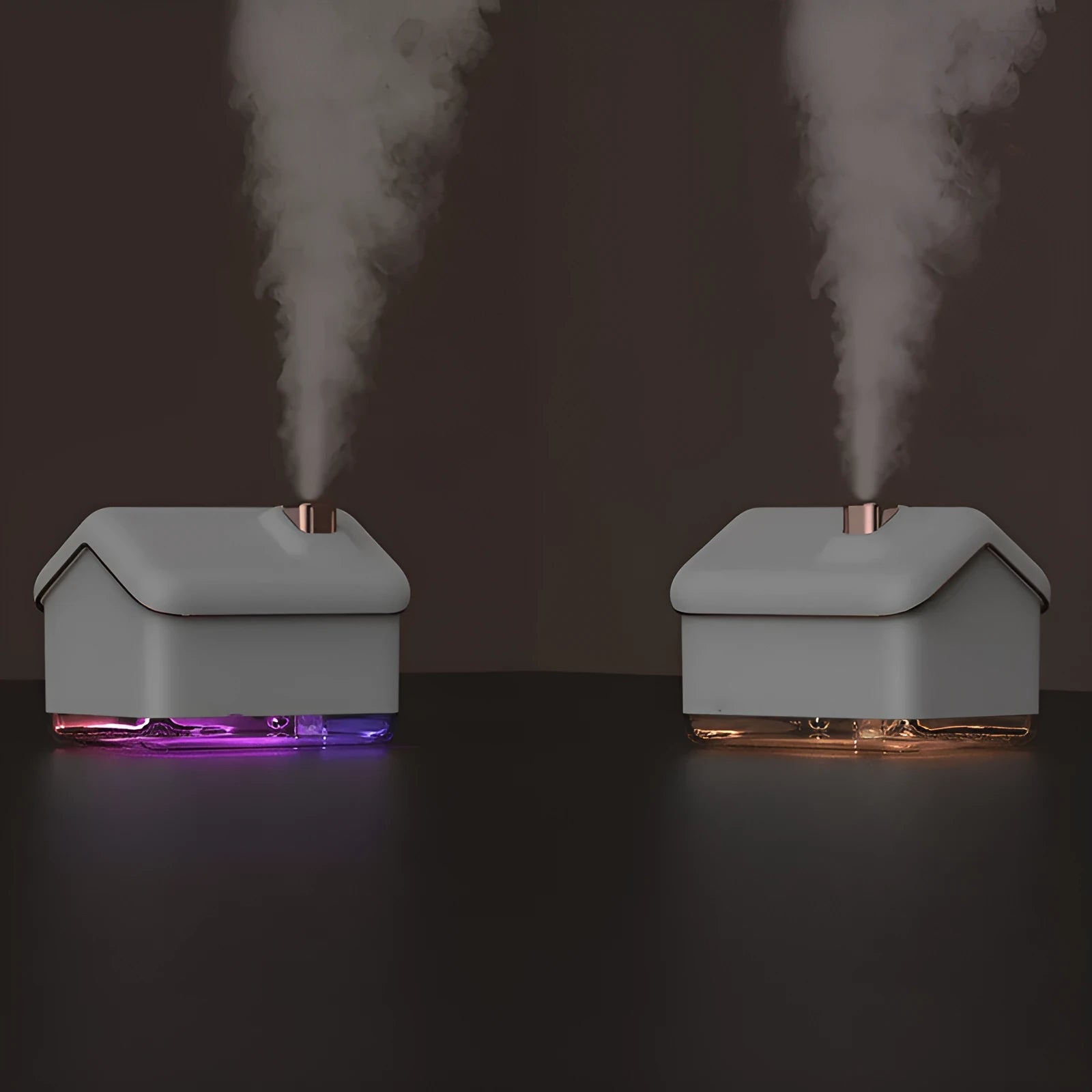 White igloo-shaped ultrasonic humidifier and essential oil diffuser with LED light on a desk.