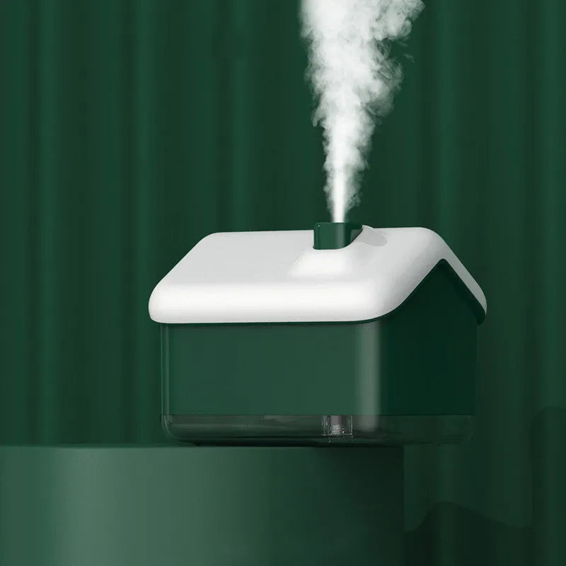 White igloo-shaped ultrasonic humidifier and essential oil diffuser with LED light on a desk.