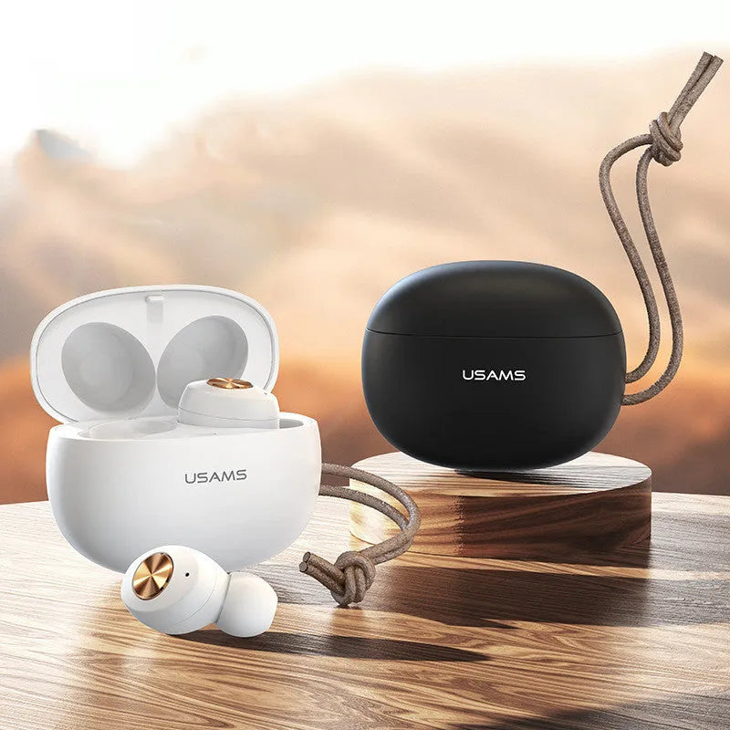 Pebble Series wireless Bluetooth TWS earbuds and compact charging case in black, white, or green.