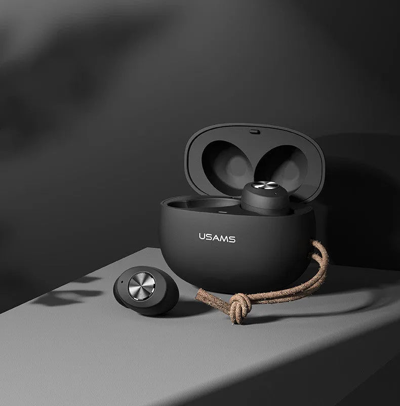 Pebble Series wireless Bluetooth TWS earbuds and compact charging case in black, white, or green.