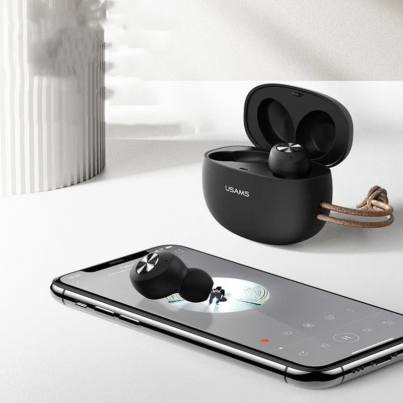 Pebble Series wireless Bluetooth TWS earbuds and compact charging case in black, white, or green.