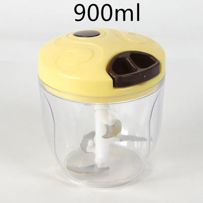 Manual kitchen chopper with stainless steel blades in green plastic housing