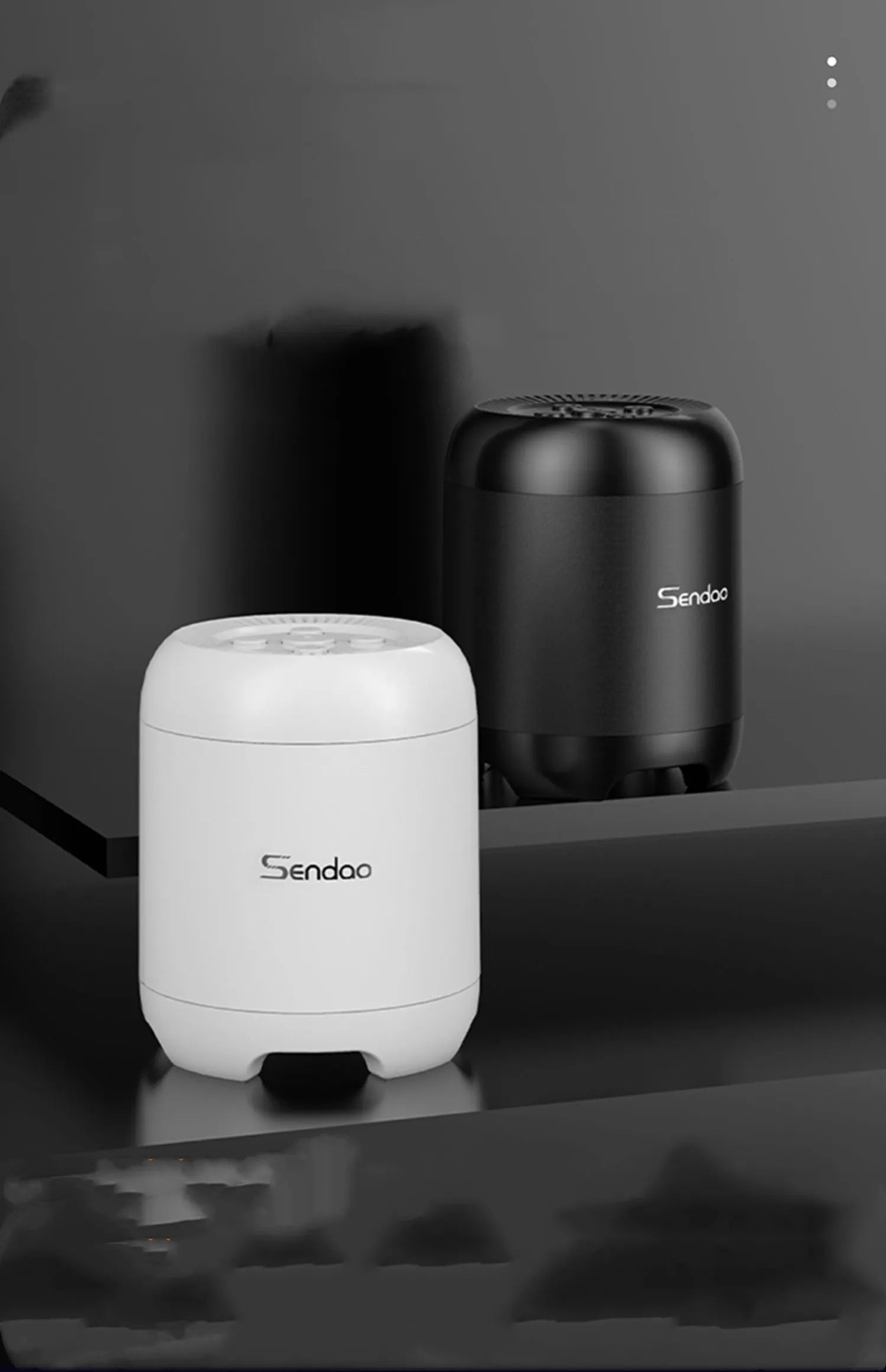 Black or white wireless Bluetooth speaker with card reader slot and compact 90x73x73mm dimensions