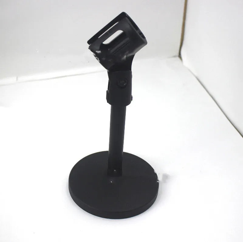 Black desktop microphone bracket with metal chassis, triangular base, and plastic clip for conference microphones