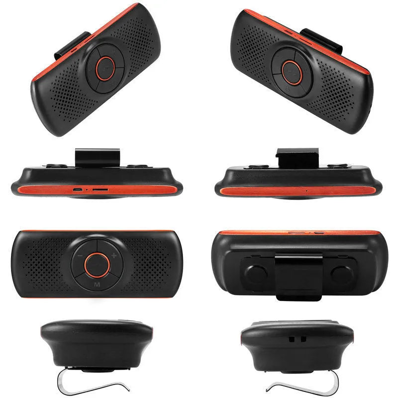 Orange plastic Bluetooth hands-free car kit mounted on a sun visor