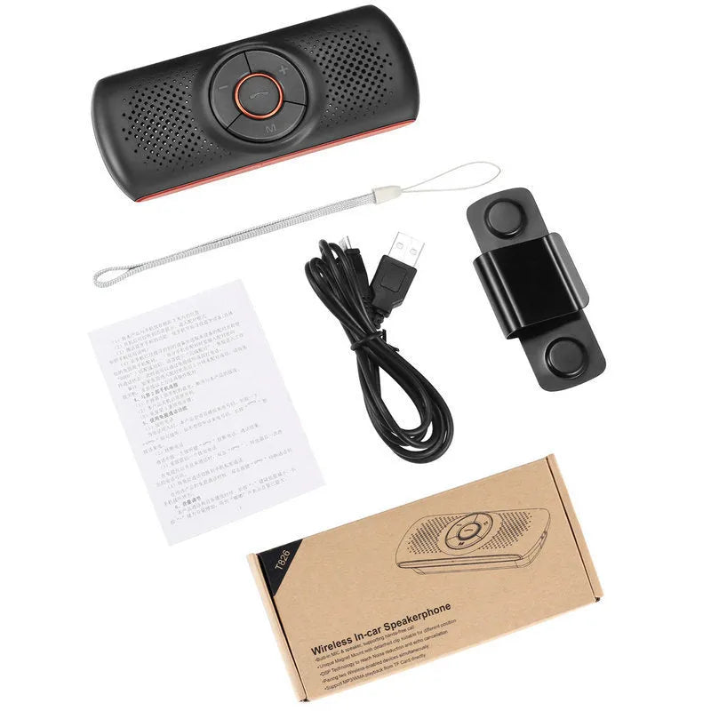 Orange plastic Bluetooth hands-free car kit mounted on a sun visor