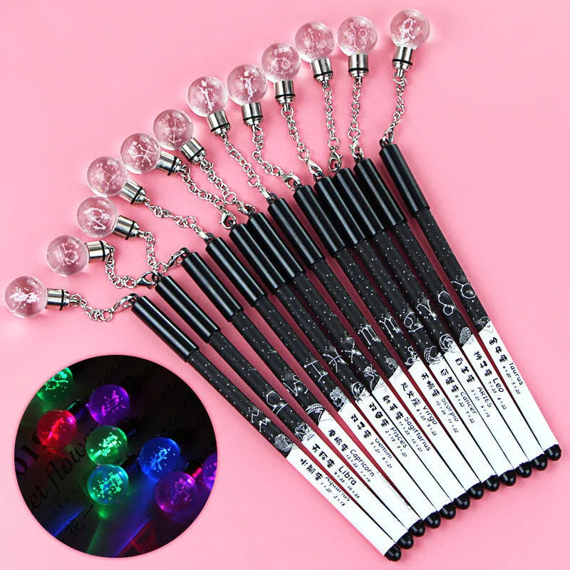 Twelve constellation-themed gel pens with needle tube 0.5mm tips and five style variations including pendant and bulb designs
