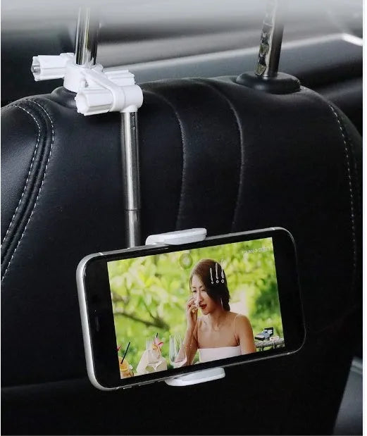 Black car mobile phone holder snapped onto a rearview mirror with cylindrical support frame, showing a smartphone in place.