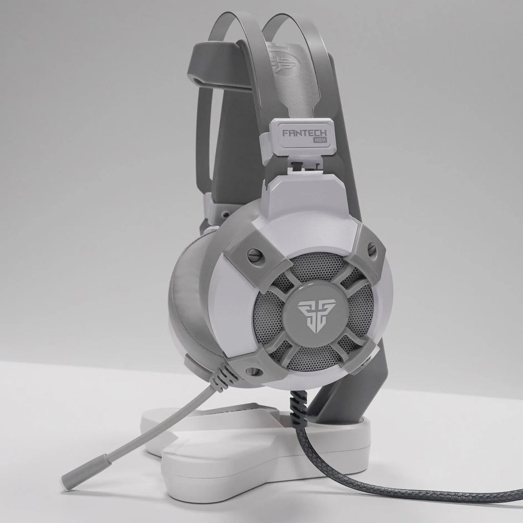 Black FANTECH HG11 gaming headset with RGB lights on earcups and a USB cable with inline remote