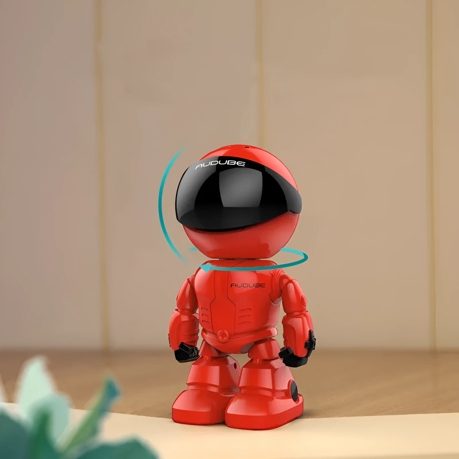 Silver remote control PTZ security camera with wide-angle lens on a motorised base.