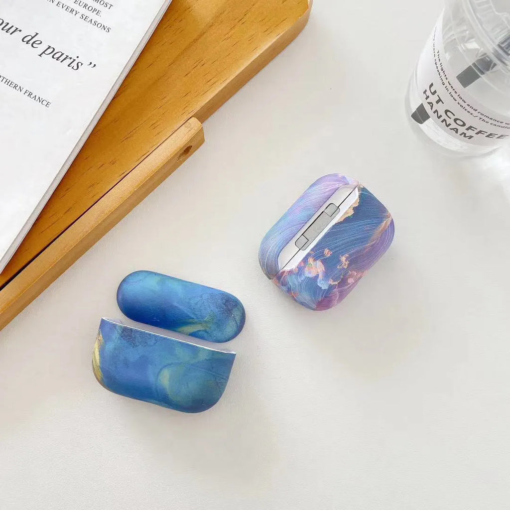 Plastic hard shell protective sleeve for AirPods Pro with watercolour pattern in pink or blue