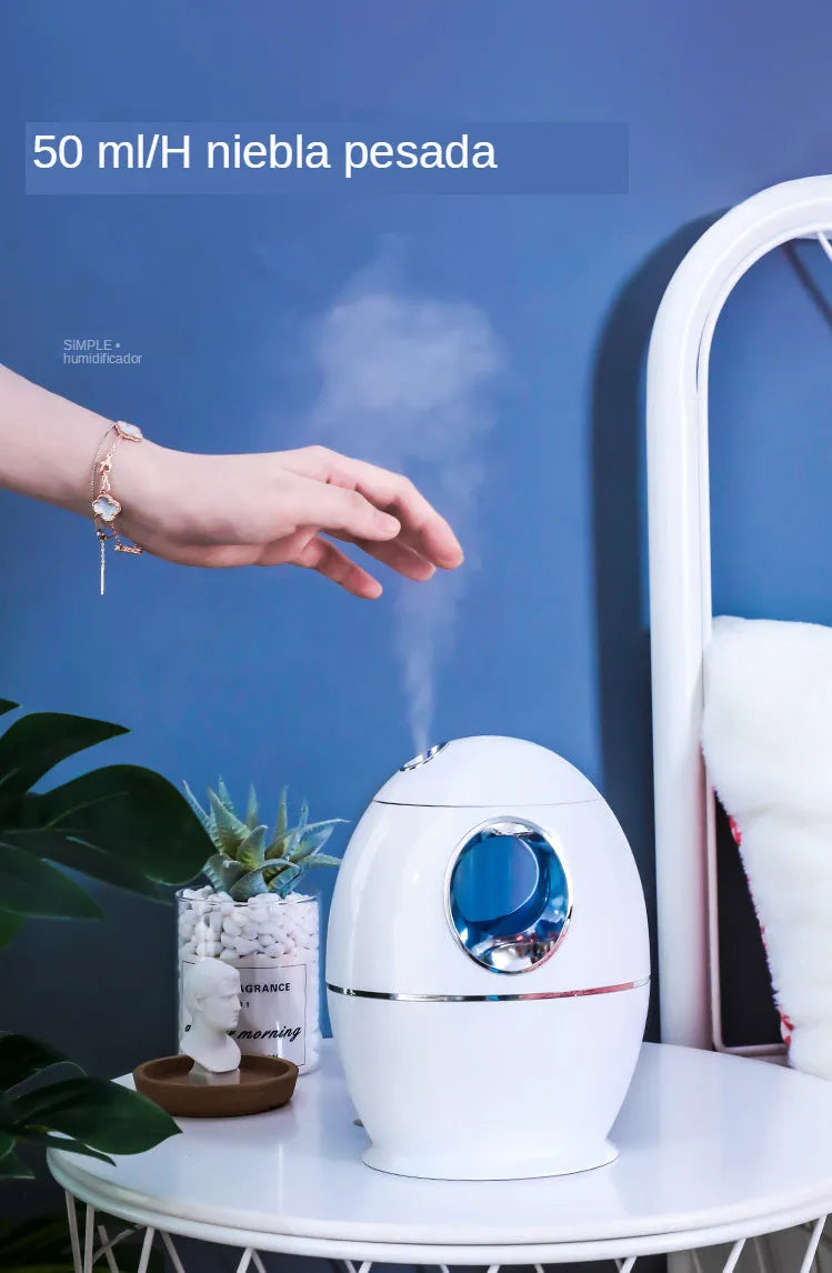 Round white silent USB aromatherapy humidifier with mist spray and 800ml water tank.