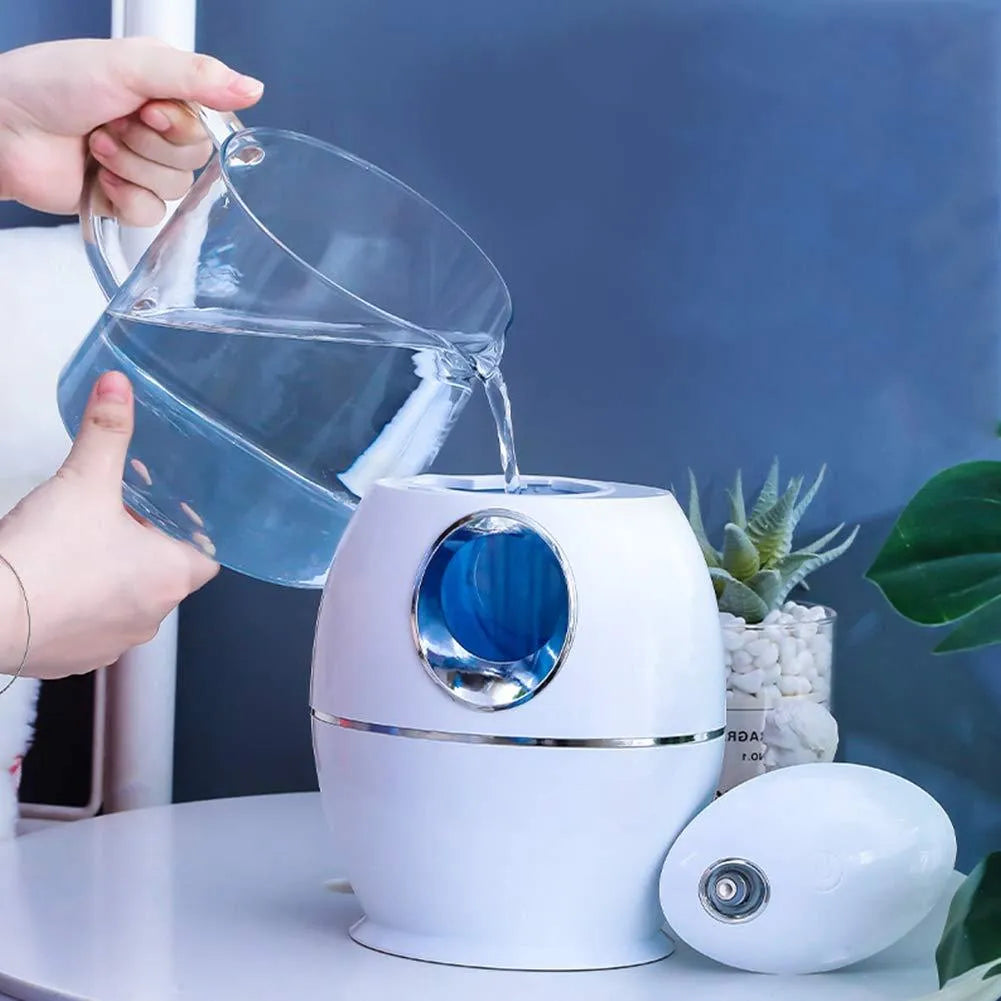 Round white silent USB aromatherapy humidifier with mist spray and 800ml water tank.