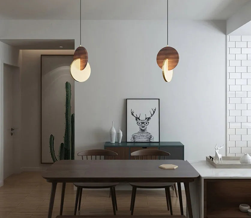 Long-line solid walnut wood wall chandelier with a simple modern design.