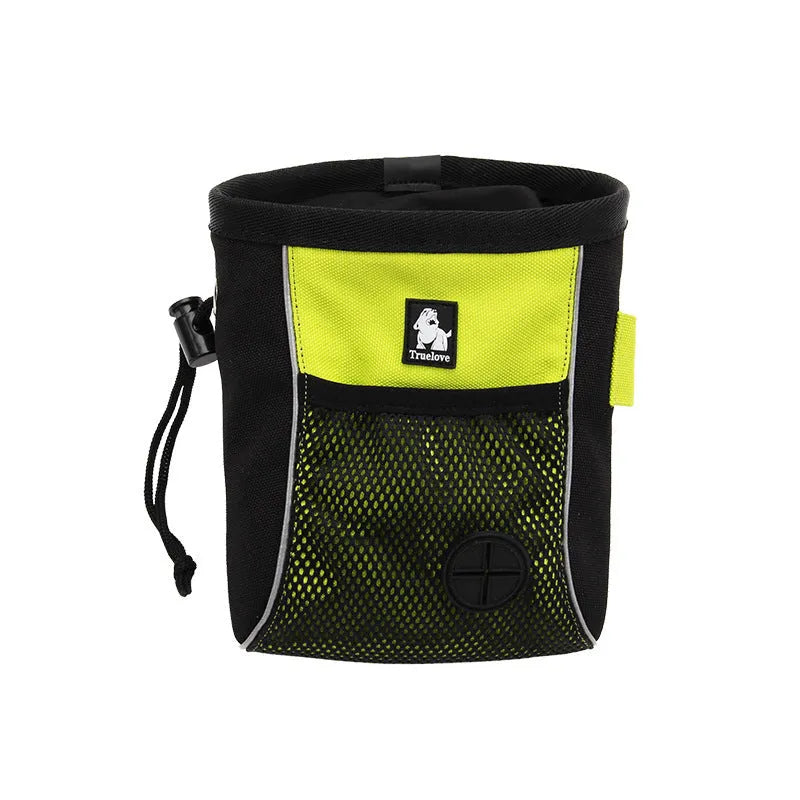 Green canvas dog training waist bag with a clip closure and removable waste bag compartment, shown on a belt.