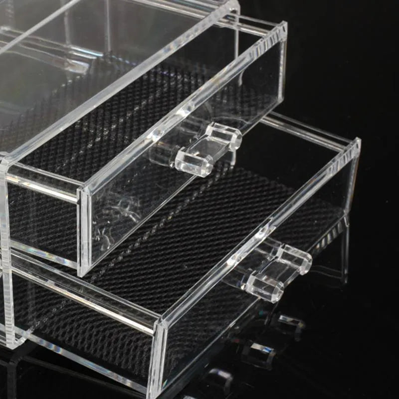 Clear acrylic foldable makeup storage box with 18-litre capacity on a dressing table.