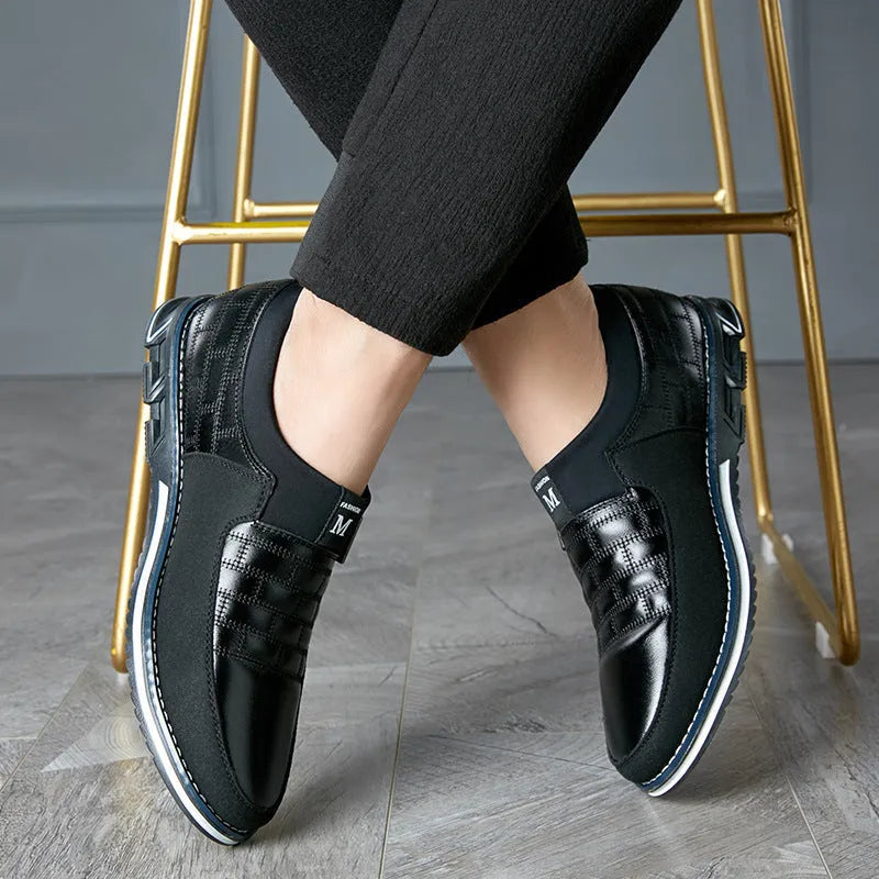 Men's casual leather shoes in black, blue, and brown colours showing low-cut design with imitation leather construction