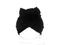 Soft acrylic knitted baby hat turban for infants and toddlers aged 0 to 28 months in a solid colour.