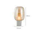 Modern Nordic glass table lamp in cognac colour with push-button switch